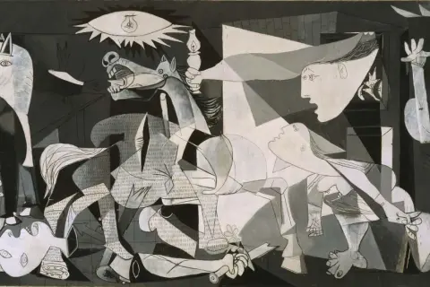 Guernica Picassa w Muzeum Narodowym Centrum Sztuki Królowej Zofii. Dramatyczna scena z bykiem, koniem i cierpiącymi ludźmi.